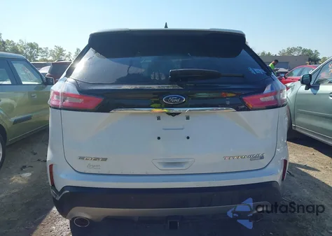 2020 Ford Edge Titanium z USA, uszkodzony, nr VIN 2FMPK4K98LBB19098